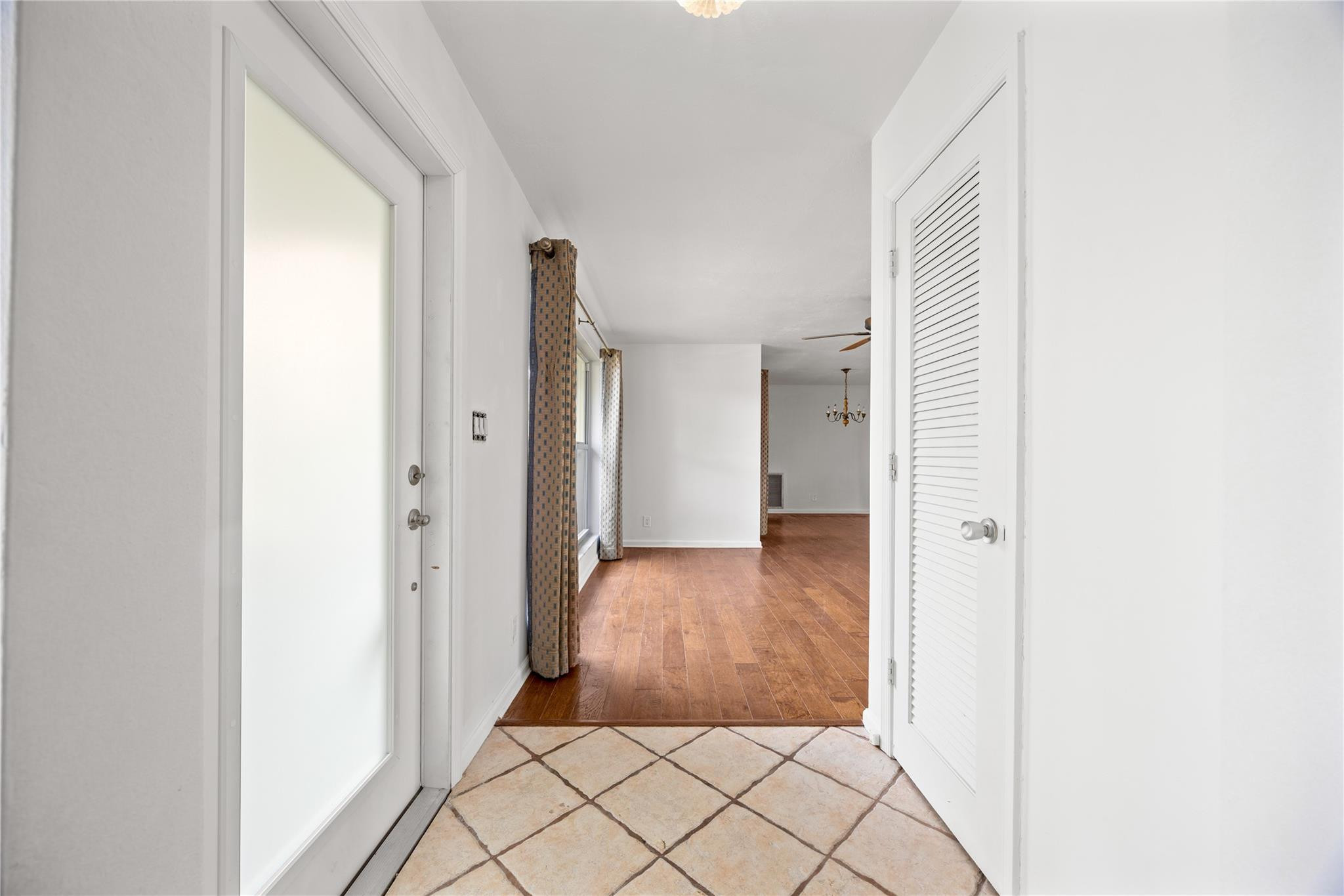 6543 Northeast 21st Road Fort Lauderdale, FL 33308 - Photo 12 of 38 a view of entryway with wooden floor