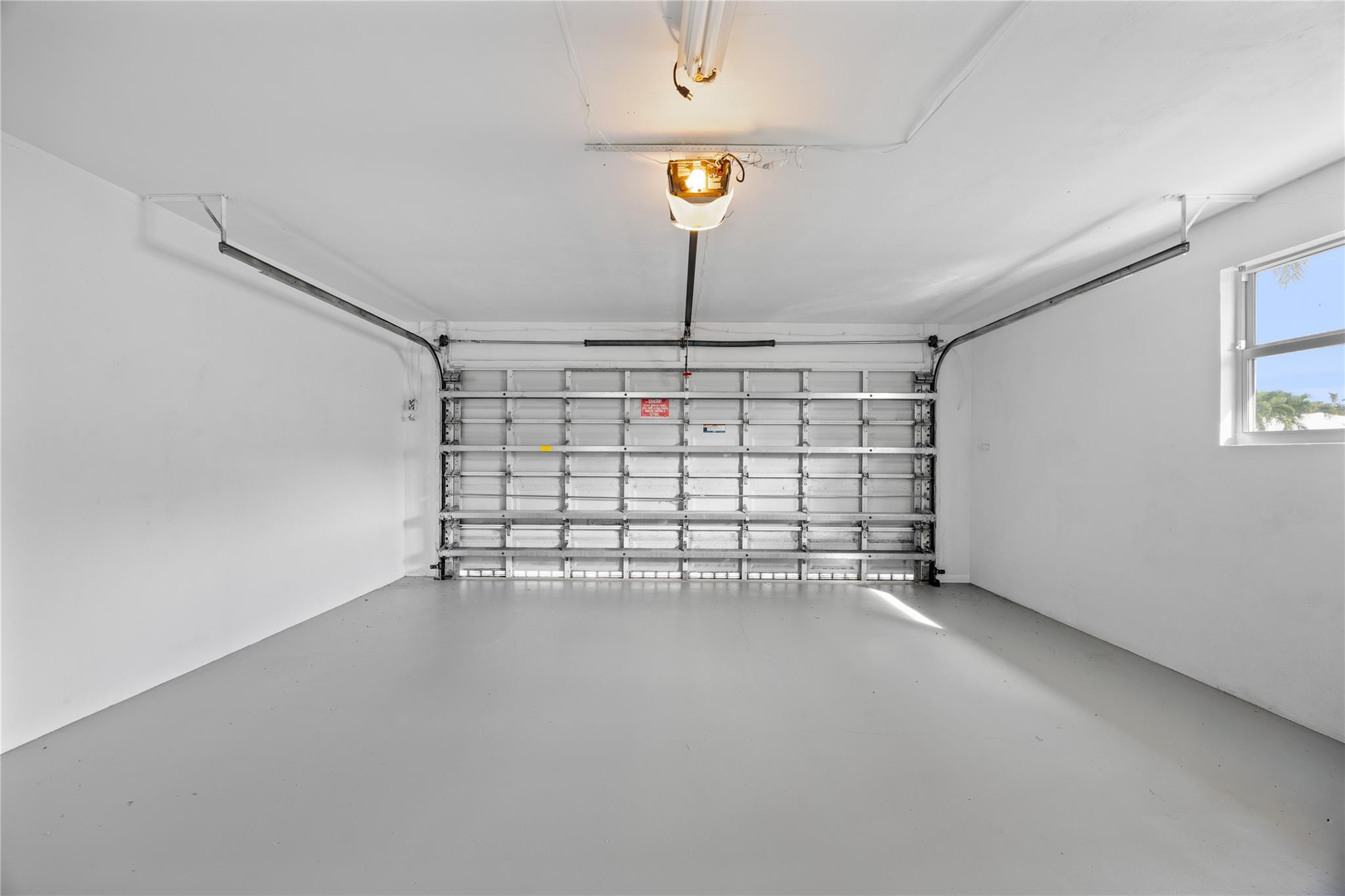 6543 Northeast 21st Road Fort Lauderdale, FL 33308 - Photo 38 of 38 a view of a garage