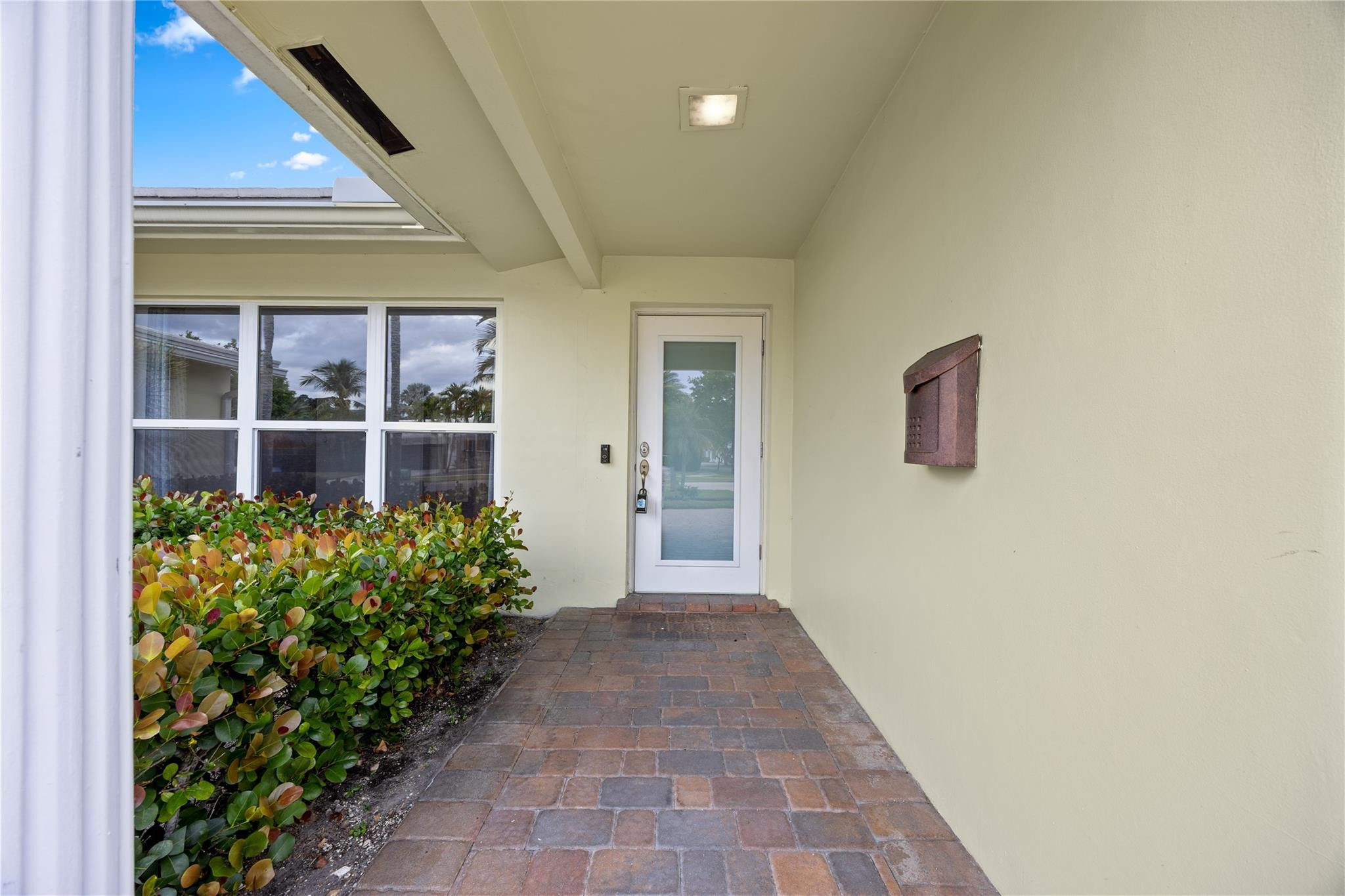 6543 Northeast 21st Road Fort Lauderdale, FL 33308 - Photo 7 of 38 a view of a entryway door of the house