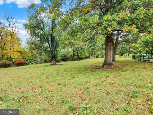 a fire hydrant in the middle of a field