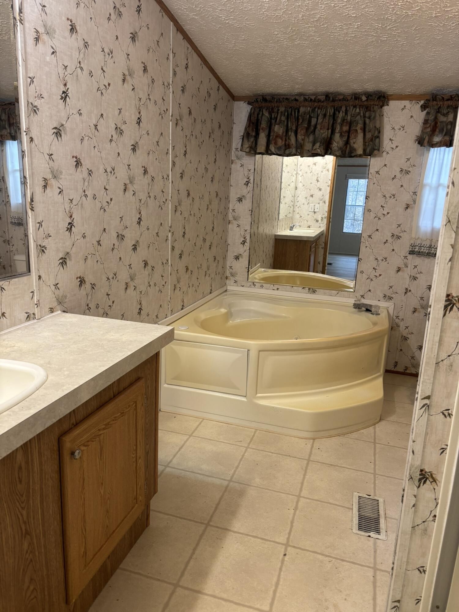 4099 Chatata Valley Road Northeast Charleston, TN 37310 - Photo 4 of 17 a bathroom with a sink and a shower