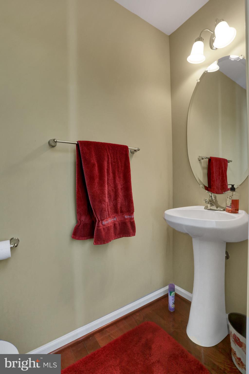 1219 Steed Street Ranson, WV 25438 - Photo 14 of 30 a bathroom with a sink and a mirror