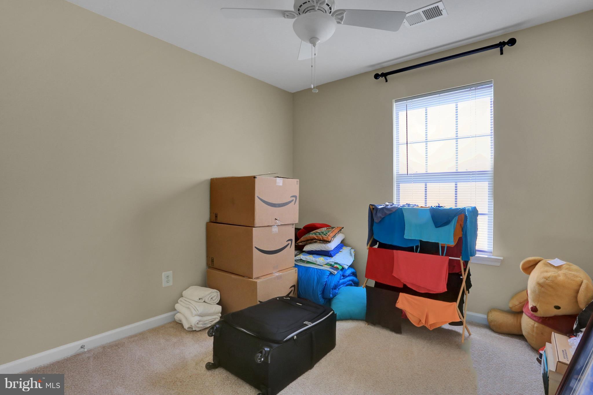 1219 Steed Street Ranson, WV 25438 - Photo 22 of 30 a room with furniture and a window