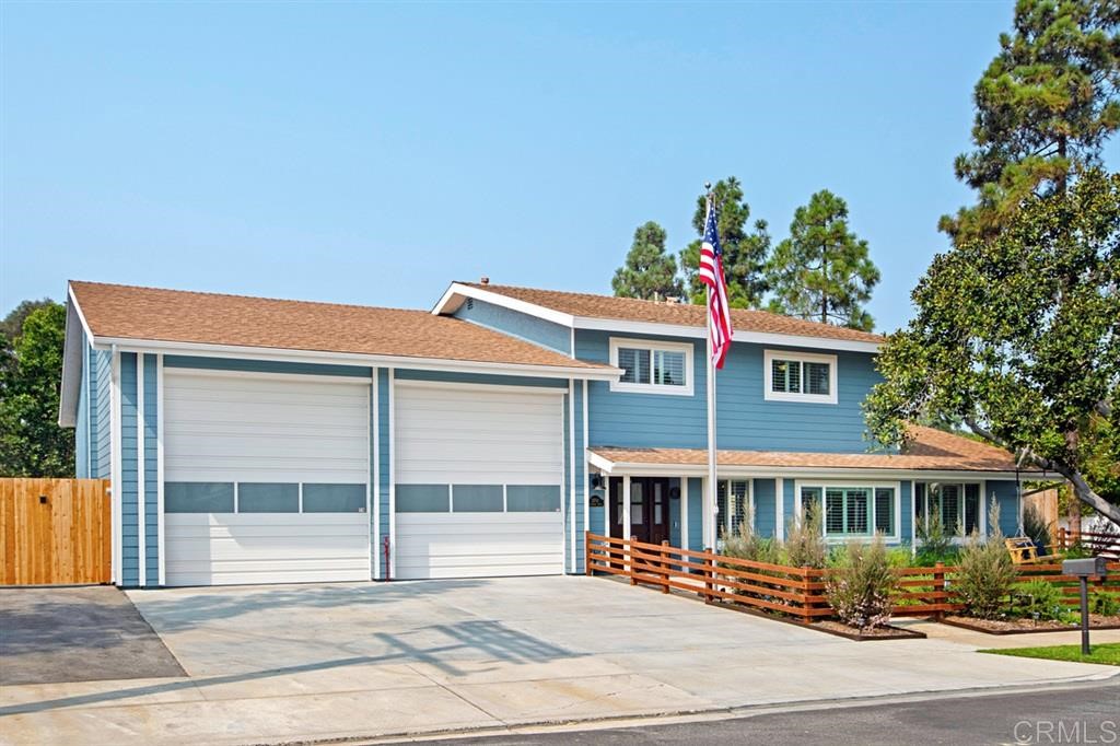 3701 Catalina Drive Carlsbad, CA 92010 - Photo 1 of 25 a front view of a house with a porch