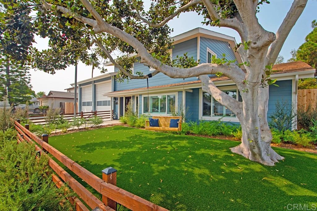3701 Catalina Drive Carlsbad, CA 92010 - Photo 2 of 25 a view of a house with backyard and a tree