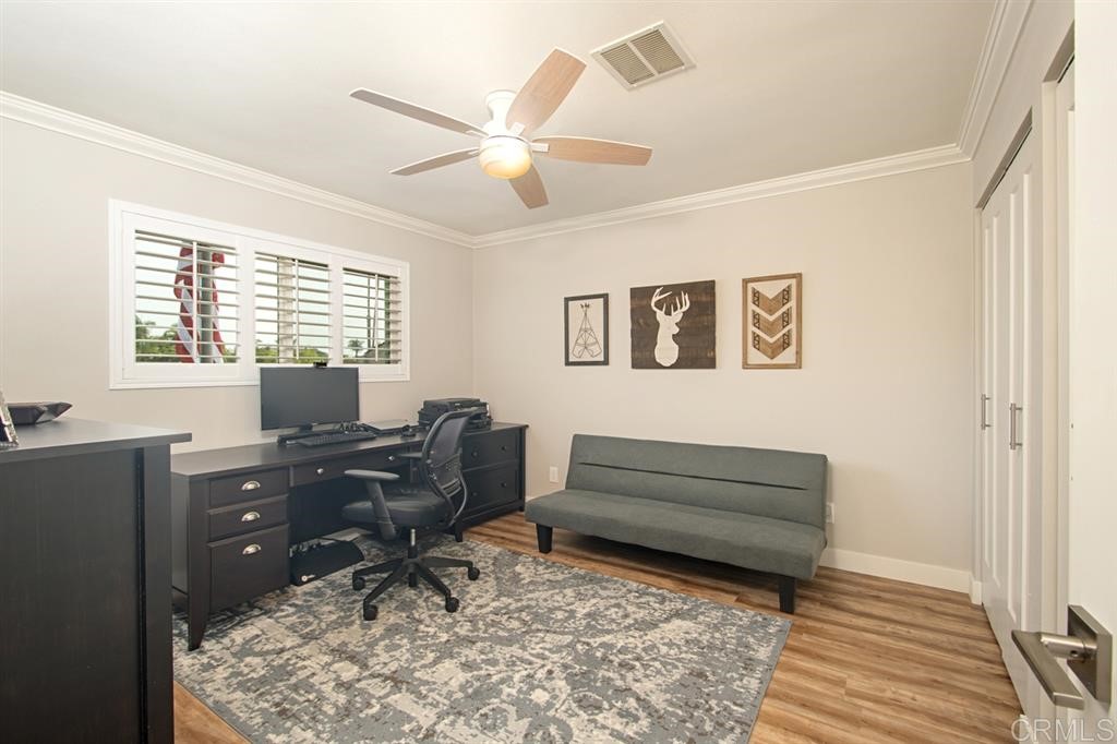 3701 Catalina Drive Carlsbad, CA 92010 - Photo 22 of 25 a living room with furniture and a rug