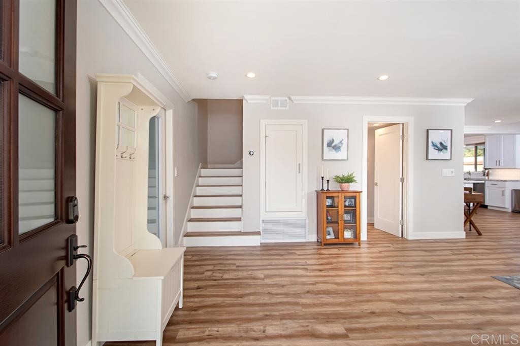 3701 Catalina Drive Carlsbad, CA 92010 - Photo 4 of 25 a view of a living room with wooden floor