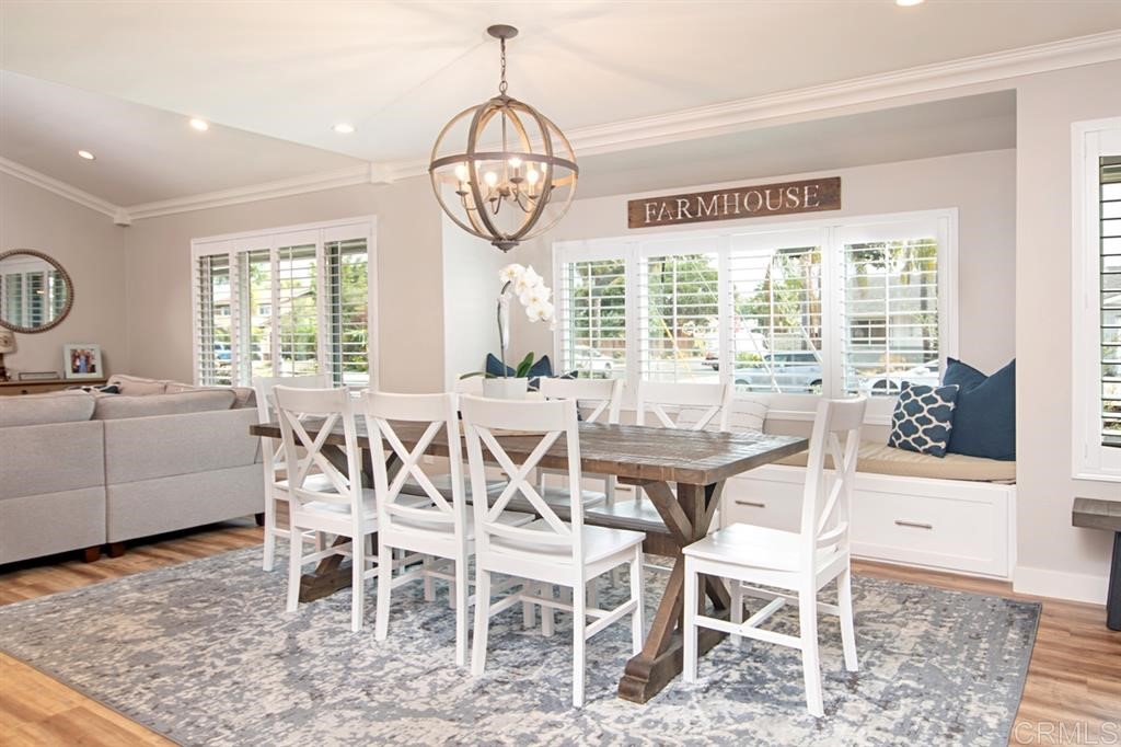 3701 Catalina Drive Carlsbad, CA 92010 - Photo 5 of 25 a view of a dining room with furniture window and wooden floor