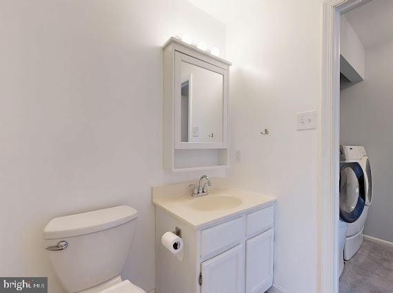8 Rutherford Place Harpers Ferry, WV 25425 - Photo 23 of 33 a bathroom with a sink a toilet and a mirror