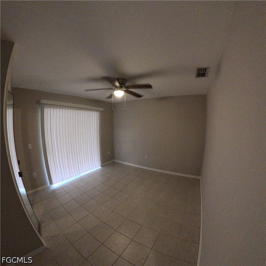 546 Whispering Wind Bend Lehigh Acres, FL 33974 - Photo 5 of 23