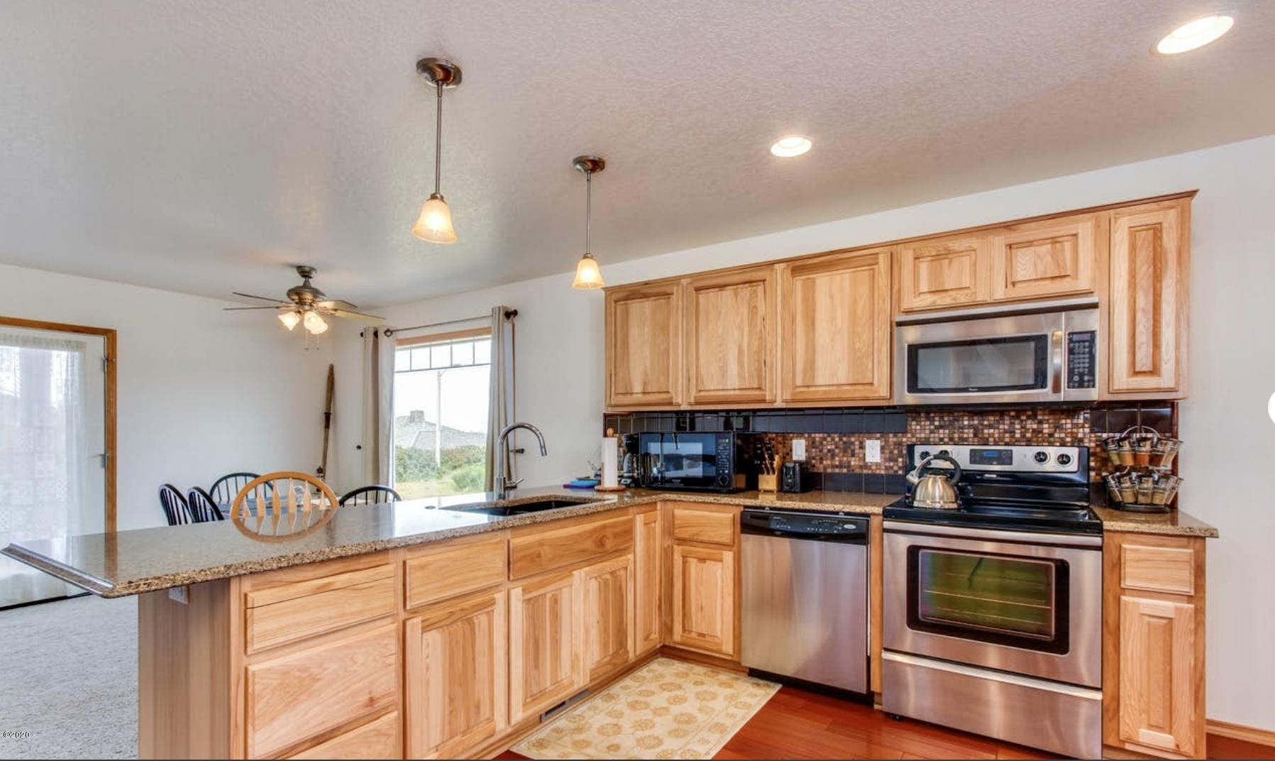5777 Logan Road Lincoln City, OR 97367 - Photo 8 of 30 Open Living Kitchen, Dining Living Room