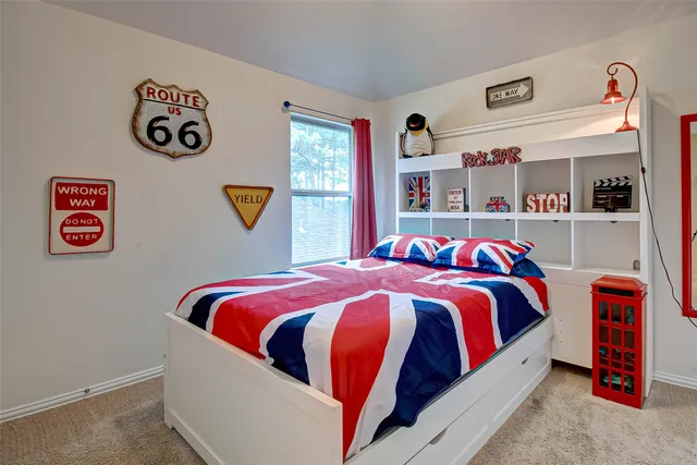 a bed room with a bed and a couch