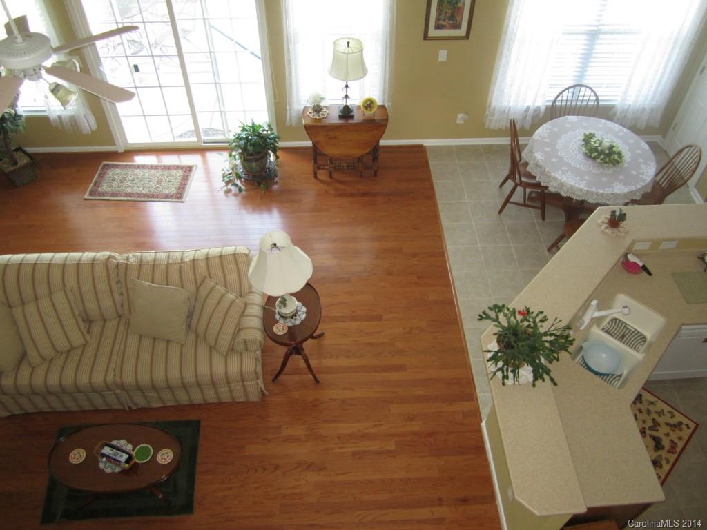 547 Turquoise Way Fort Mill, SC 29708 - Photo 11 of 12 a living room with furniture and a wooden floor