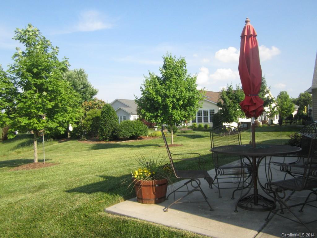 547 Turquoise Way Fort Mill, SC 29708 - Photo 12 of 12 a view of a table and chairs in the garden