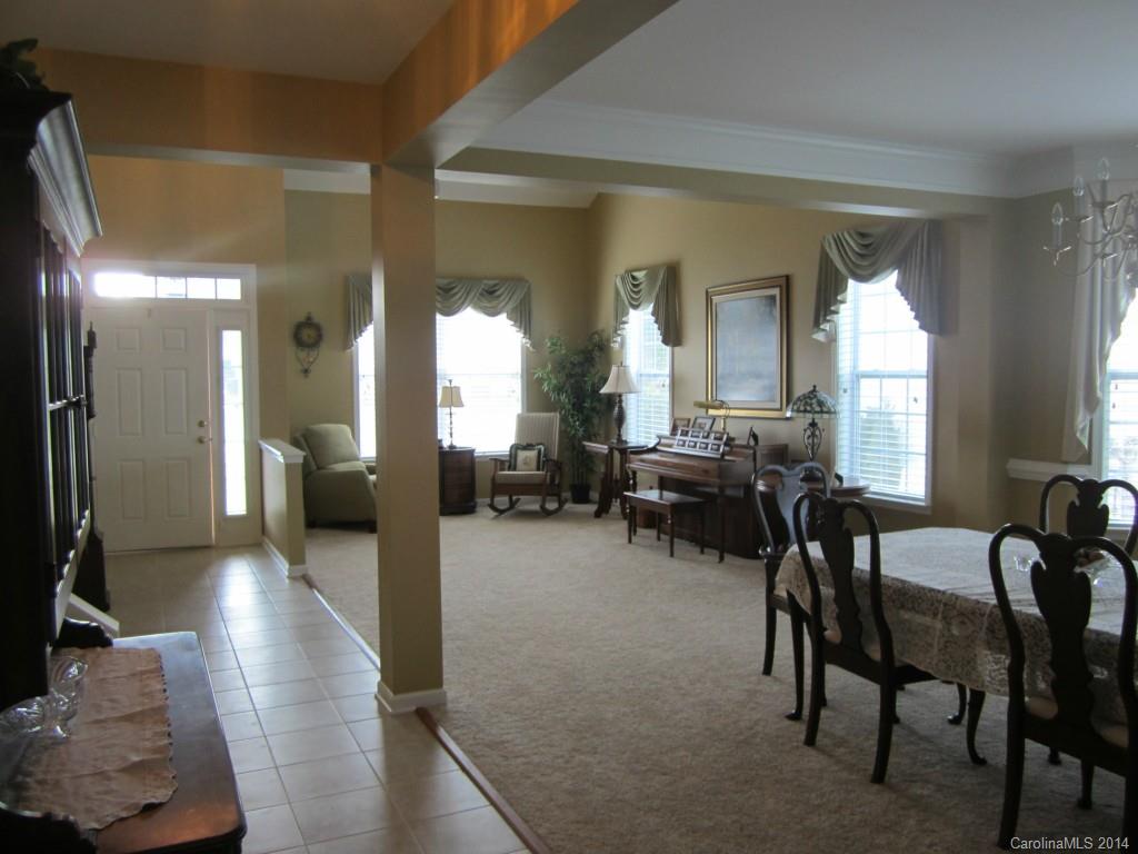 547 Turquoise Way Fort Mill, SC 29708 - Photo 3 of 12 a living room with furniture and a large window