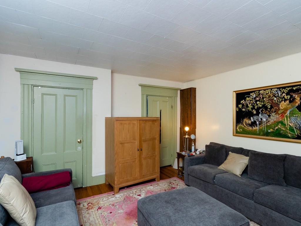 11 Rugdale Road Boston, MA 02124 - Photo 9 of 29 a living room with furniture and a window