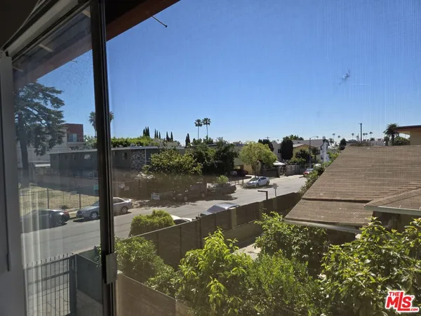 a view of a lake from a balcony