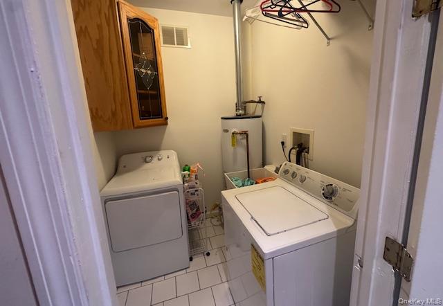 241 Main Street, Unit 2 Cornwall, NY 12518 - Photo 11 of 12 a utility room with dryer and washer