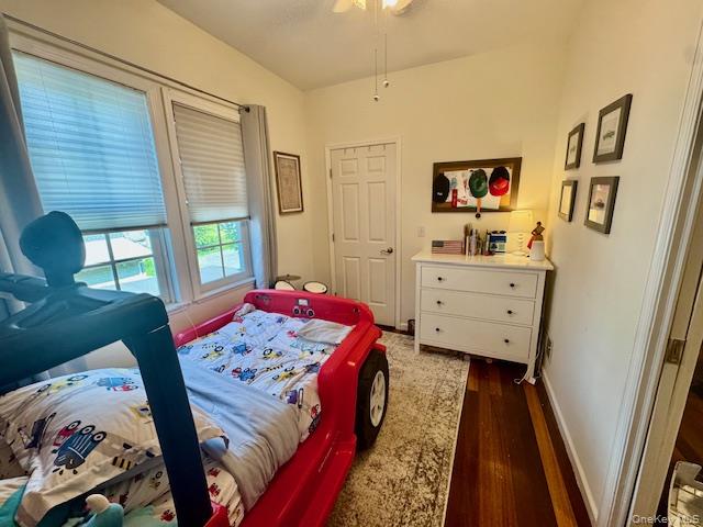 241 Main Street, Unit 2 Cornwall, NY 12518 - Photo 7 of 12 a bedroom with a bed and a dresser next to a window