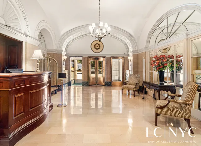 a kitchen with a sink and a refrigerator