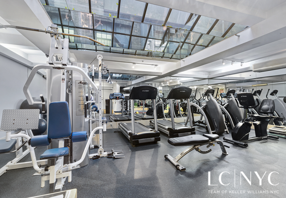 575 Park Avenue, Unit 1105 Manhattan, NY 10065 - Photo 11 of 18 a view of a room with gym equipment