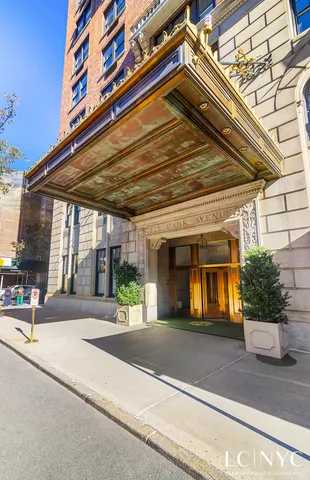 a view of front door with wooden floor