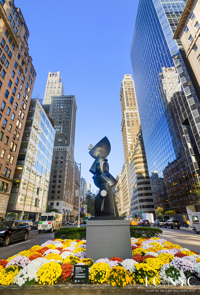 575 Park Avenue, Unit 1105 Manhattan, NY 10065 - Photo 17 of 18 a view of building with swimming pool