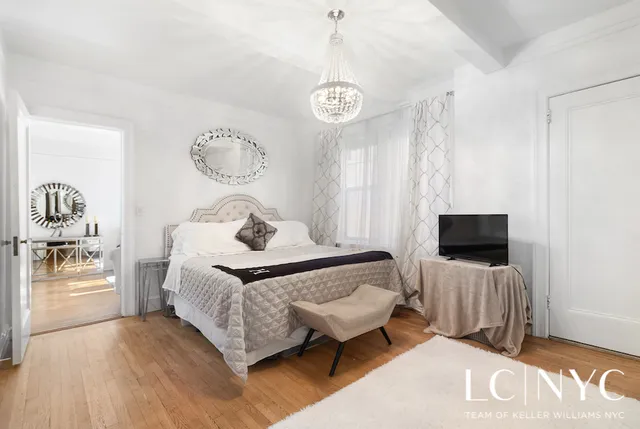 a living room with furniture a dining table and a fireplace