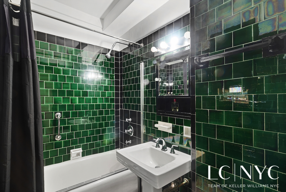 575 Park Avenue, Unit 1105 Manhattan, NY 10065 - Photo 8 of 18 a bathroom with a sink mirror toilet and shower