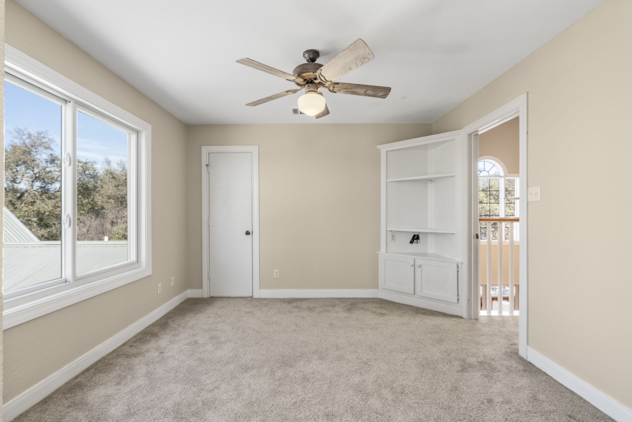 310 County Road 317 Georgetown, TX 78626 - Photo 22 of 40 Upstairs Bedroom - Has great views at the sitting area not shown