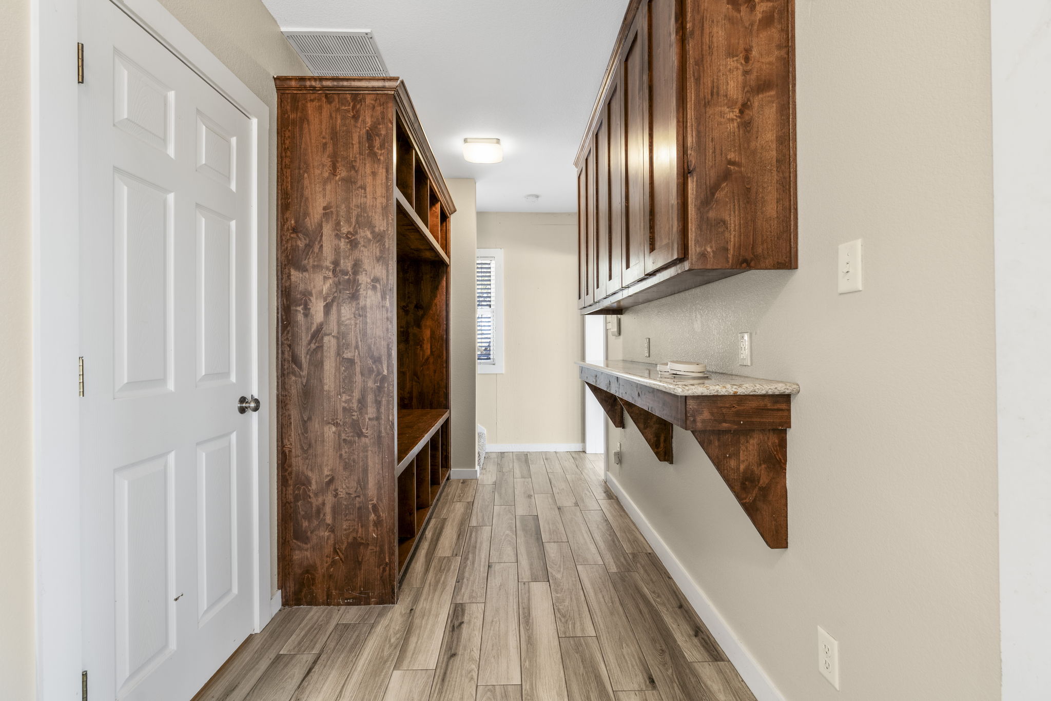310 County Road 317 Georgetown, TX 78626 - Photo 28 of 40 Mudroom featuring light wood-type flooring and baseboards
