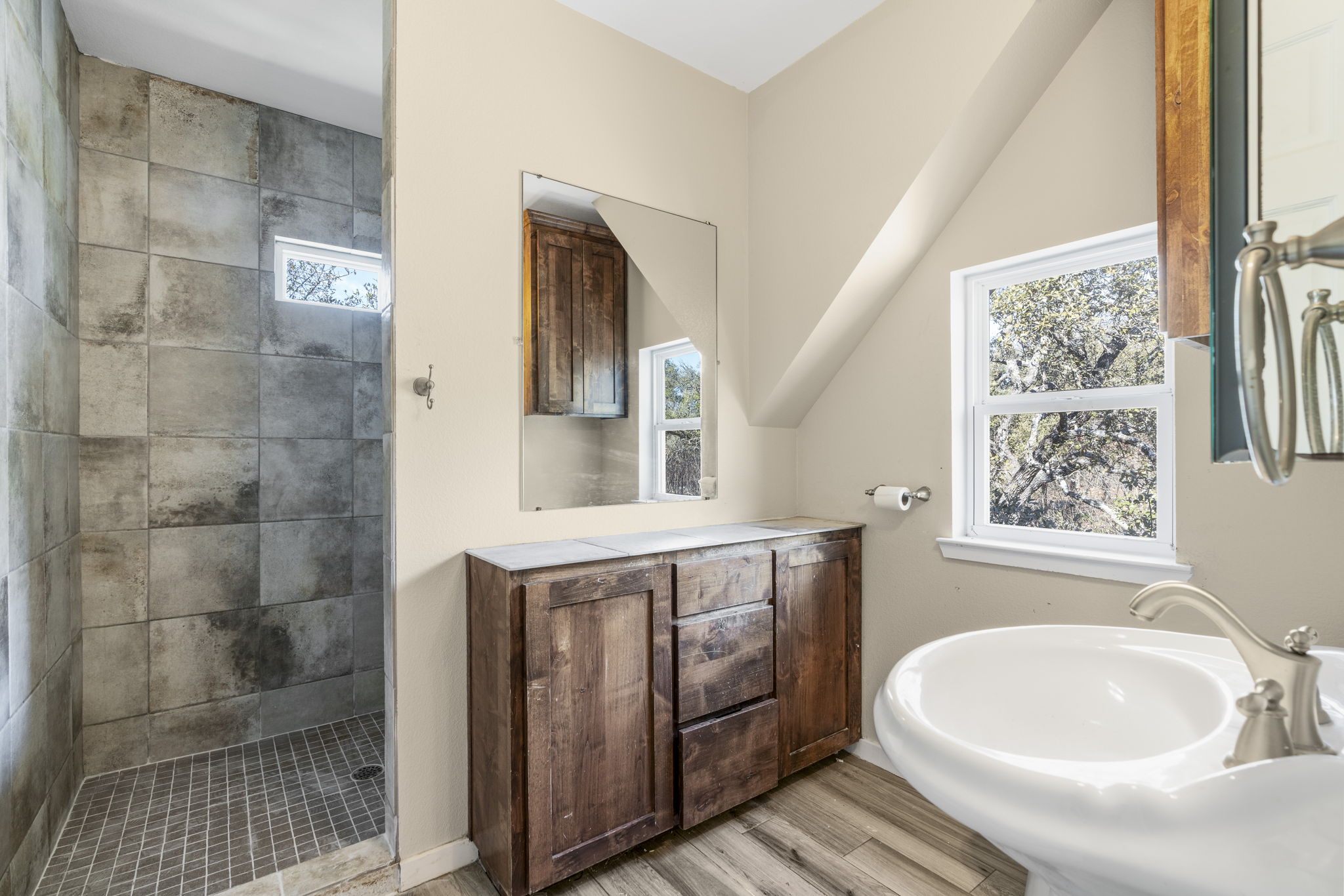 310 County Road 317 Georgetown, TX 78626 - Photo 29 of 40 Guest house upstairs full bathroom with walk-in shower
