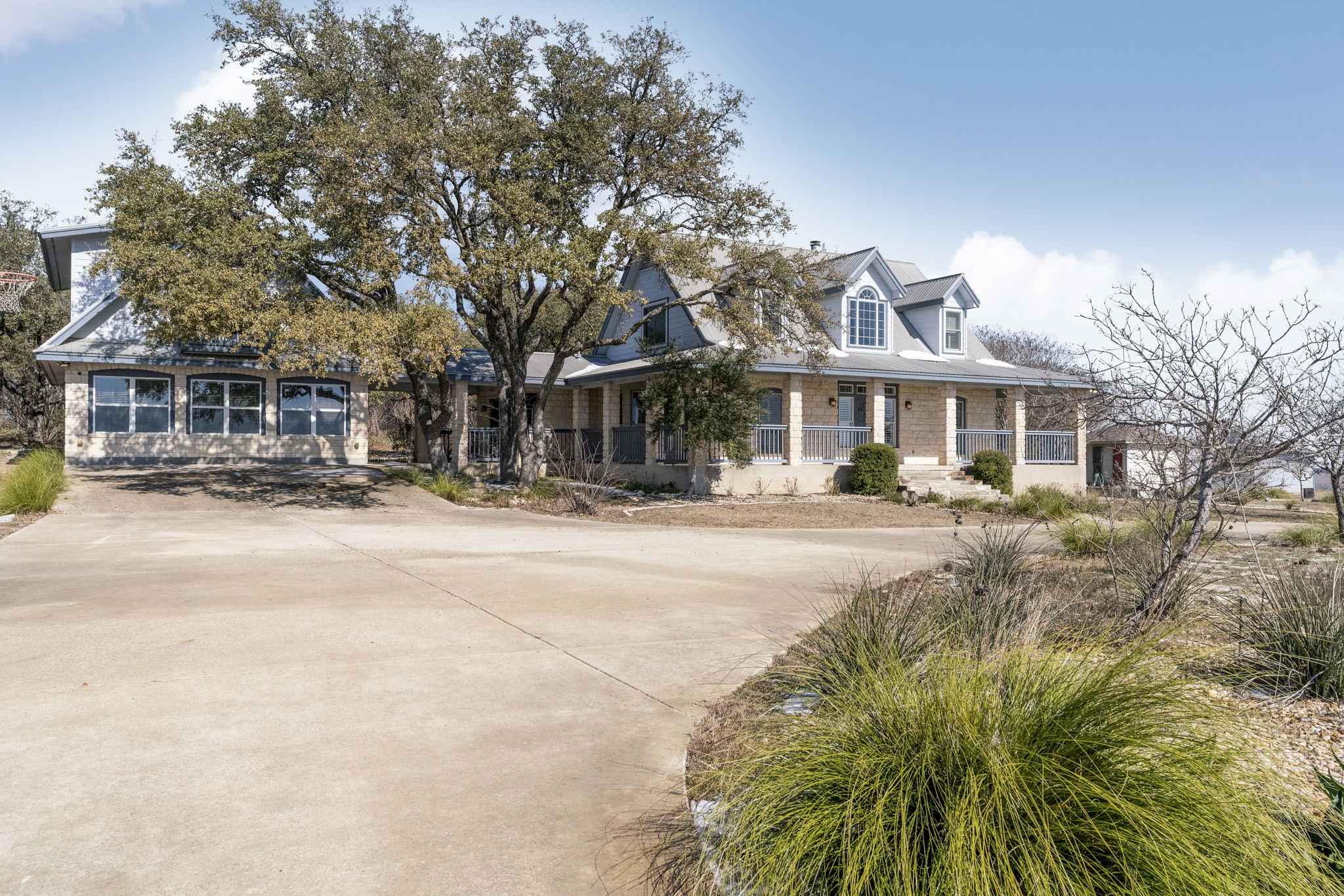 310 County Road 317 Georgetown, TX 78626 - Photo 4 of 40 View of front of property with covered porch and driveway