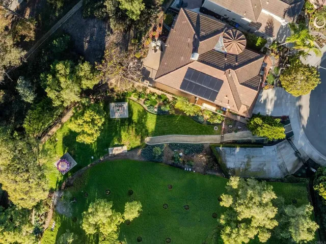 a backyard of a house with lots of green space