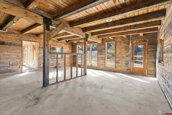 a view of an empty room with entrance