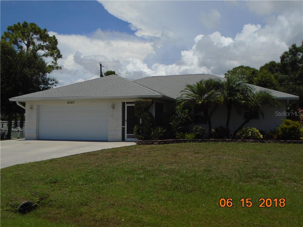 4327 Tarpon Road Venice, FL 34293 - Photo 1 of 1 a front view of a house with garden
