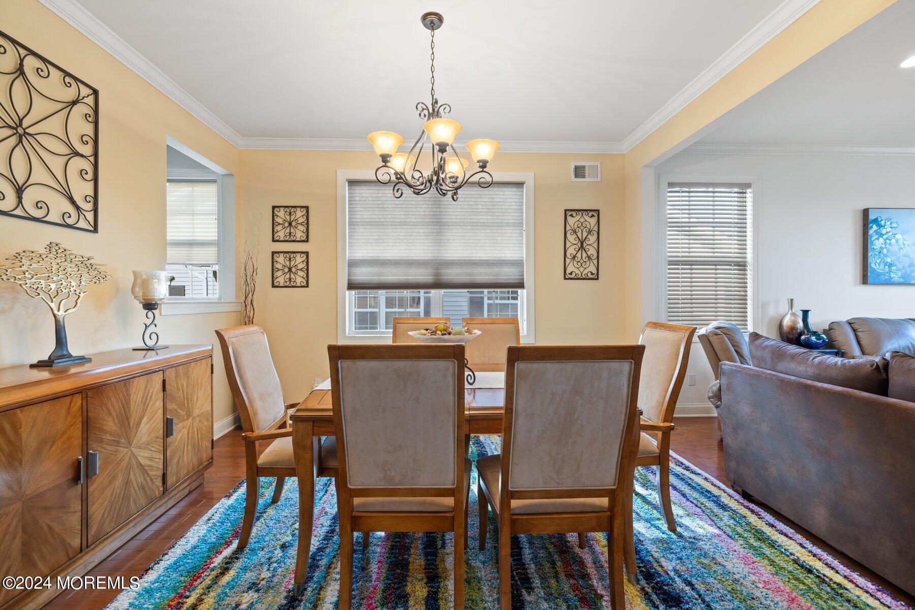 20 Silver Maple Lane Howell, NJ 07731 - Photo 11 of 35 a view of a dining room with furniture window and wooden floor