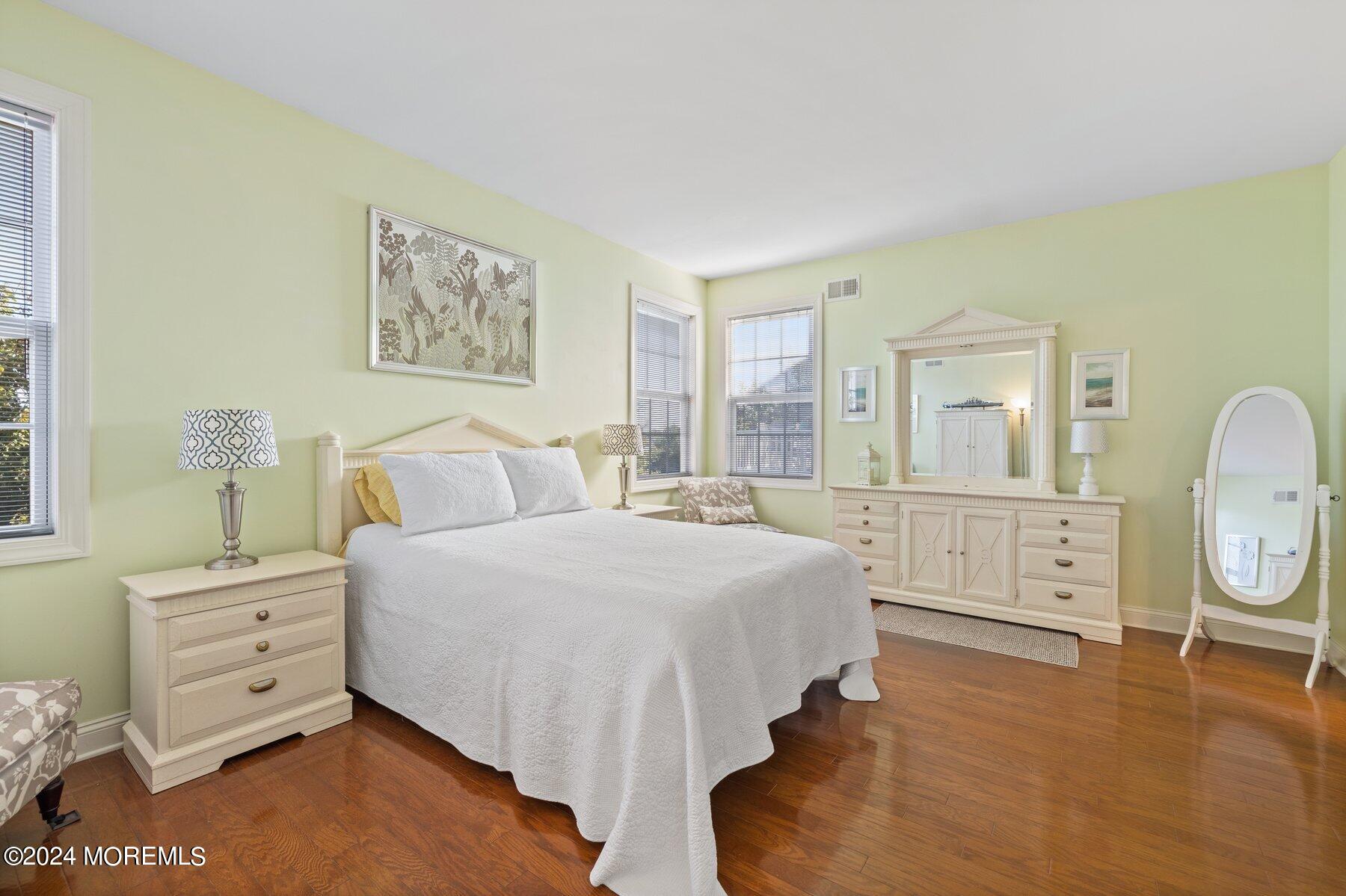 20 Silver Maple Lane Howell, NJ 07731 - Photo 14 of 35 a bedroom with a bed and wooden floor