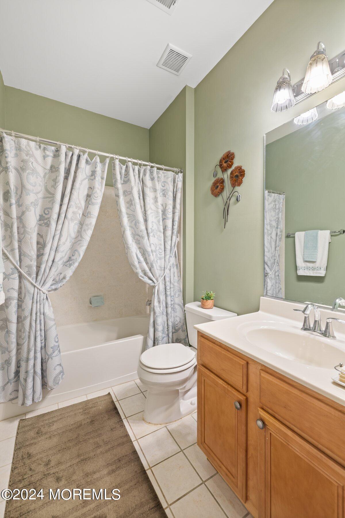 20 Silver Maple Lane Howell, NJ 07731 - Photo 23 of 35 a bathroom with a sink a toilet and a bathtub