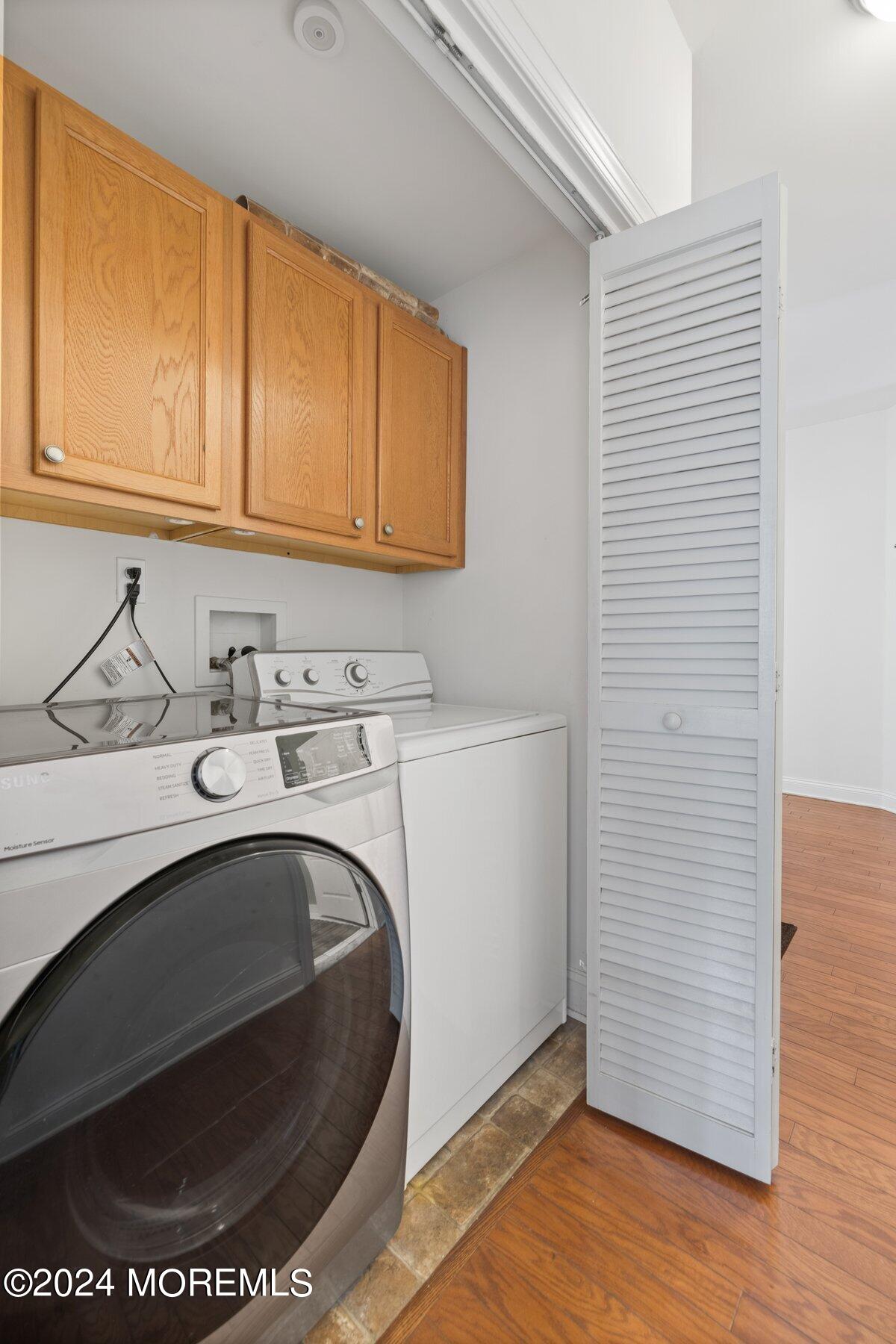 20 Silver Maple Lane Howell, NJ 07731 - Photo 24 of 35 a utility room with cabinets washer and dryer
