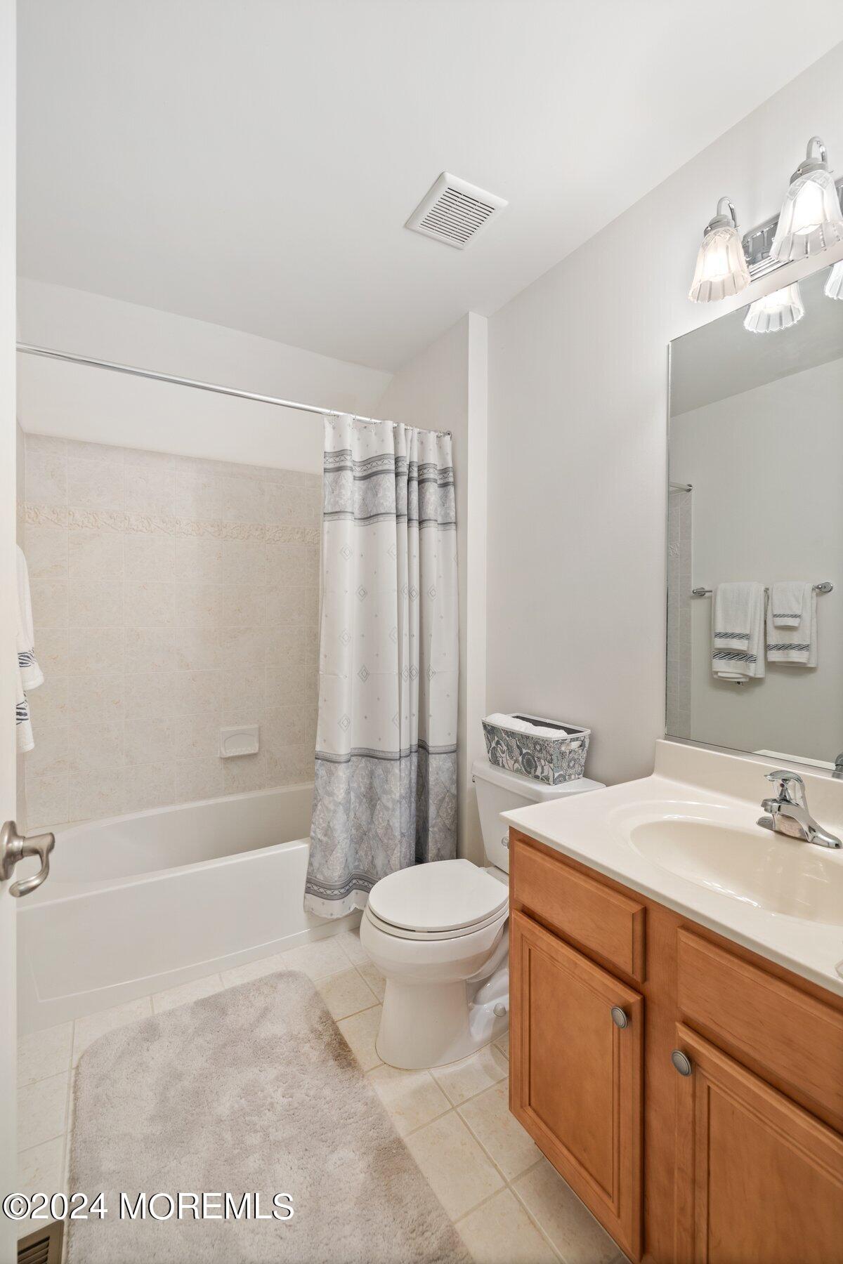 20 Silver Maple Lane Howell, NJ 07731 - Photo 30 of 35 a bathroom with a sink a toilet and shower