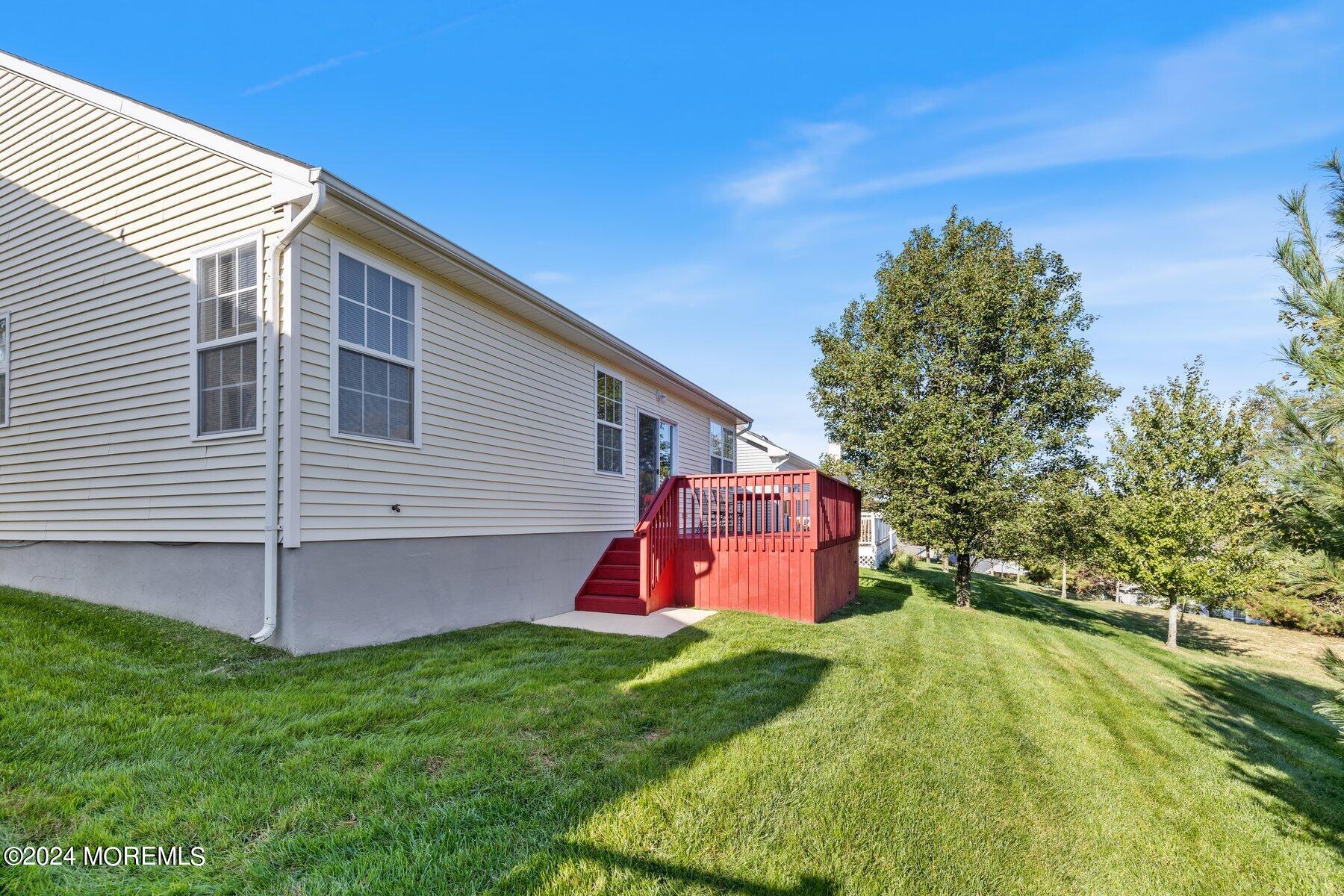 20 Silver Maple Lane Howell, NJ 07731 - Photo 32 of 35 a view of a backyard with a garden