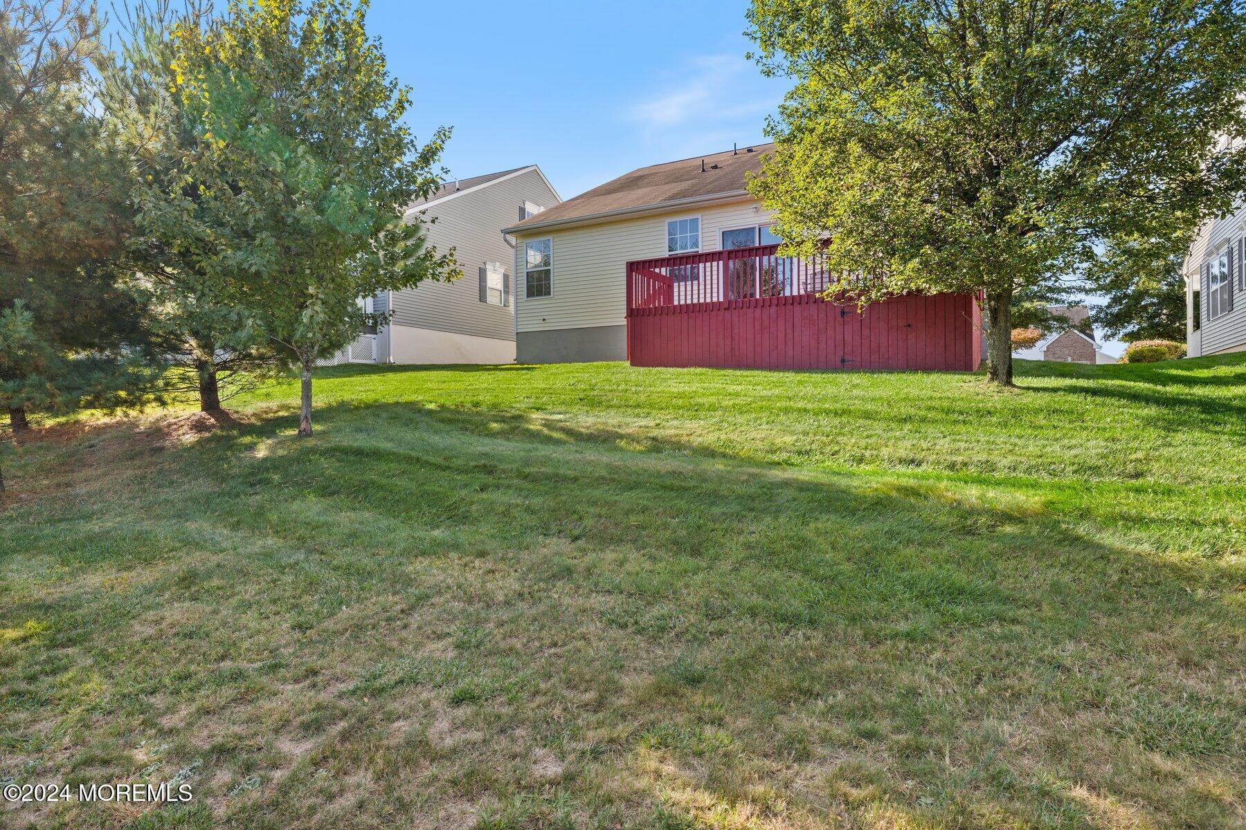 20 Silver Maple Lane Howell, NJ 07731 - Photo 35 of 35 a view of a yard with a house