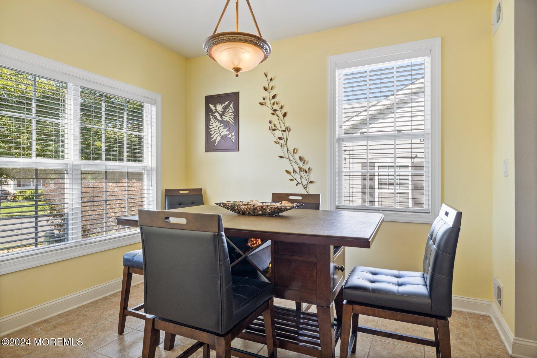 20 Silver Maple Lane Howell, NJ 07731 - Photo 8 of 35 a view of a dining room with furniture window and outside view