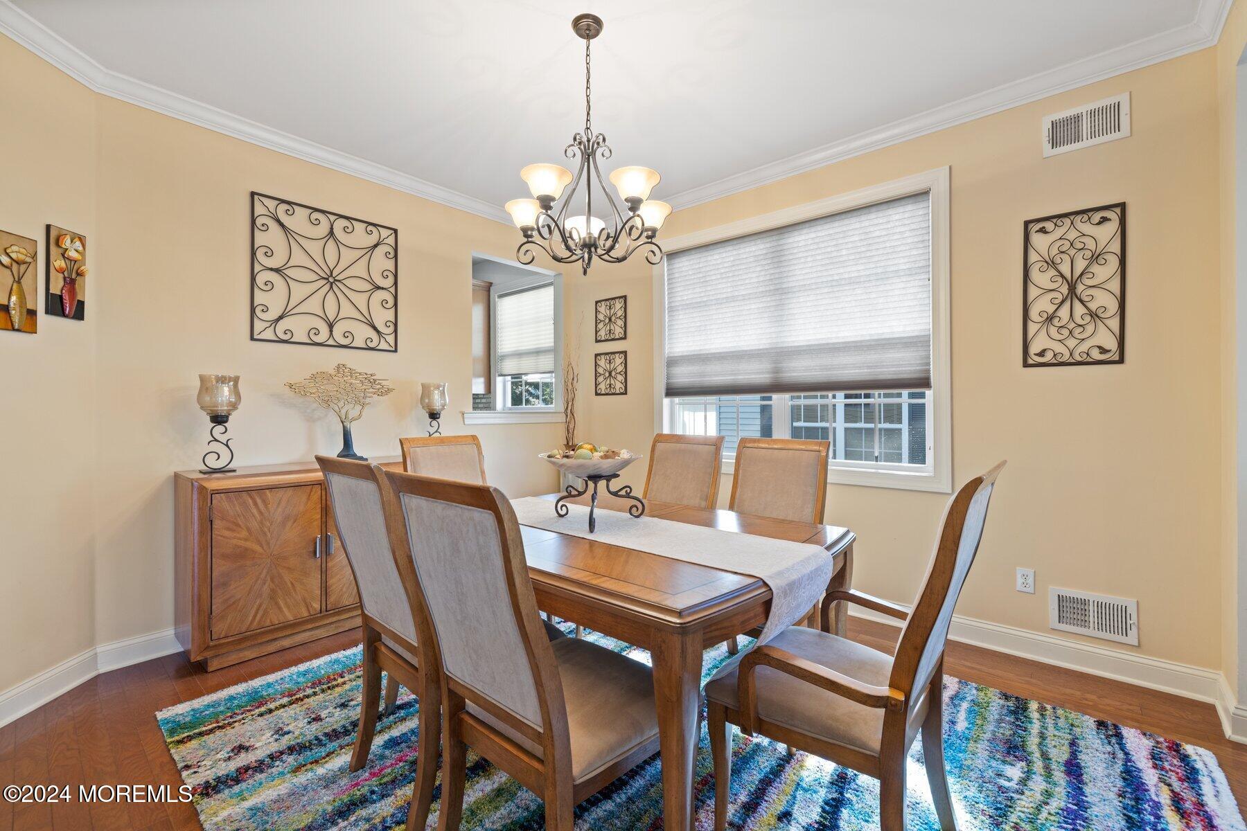 20 Silver Maple Lane Howell, NJ 07731 - Photo 9 of 35 a view of a dining room with furniture window and wooden floor