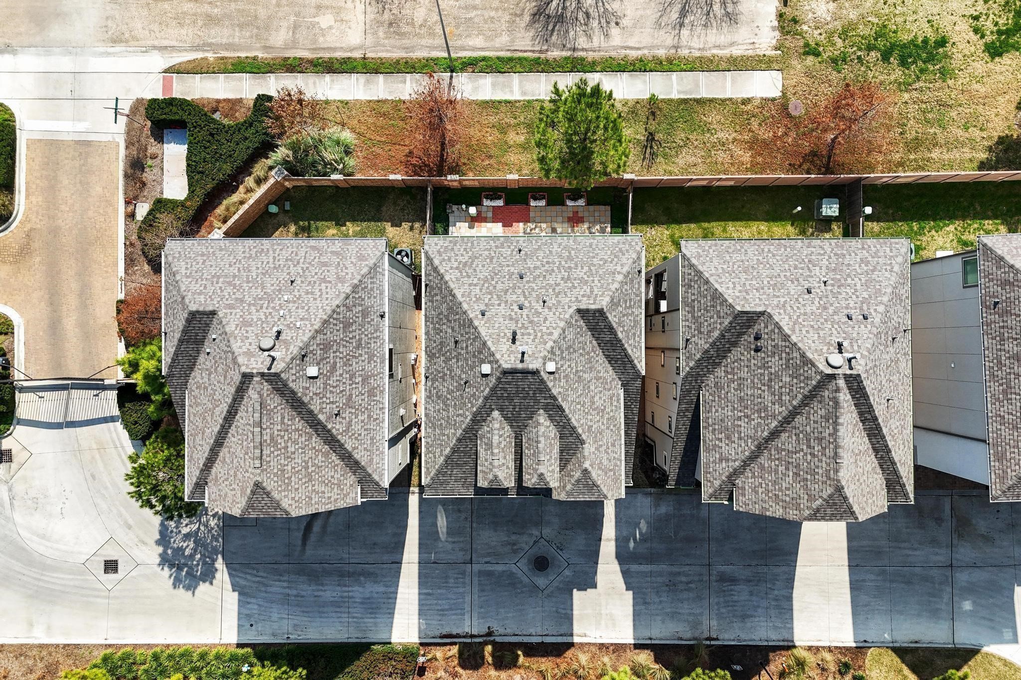 10605 Centre Green Way Houston, TX 77043 - Photo 5 of 22 an aerial view of a house with large trees