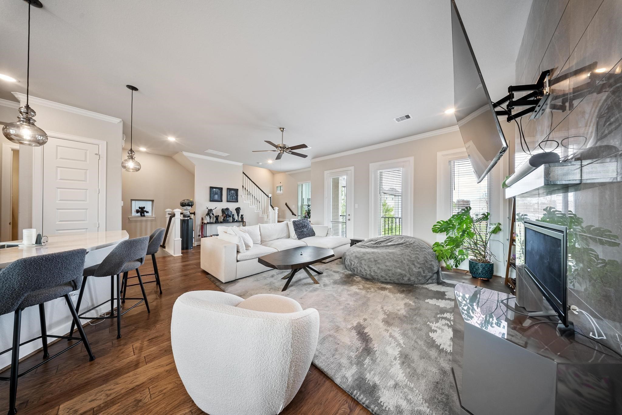 10605 Centre Green Way Houston, TX 77043 - Photo 9 of 22 a living room with furniture and a fireplace