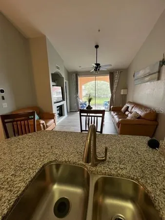 a view of a kitchen island with furniture and kitchen view