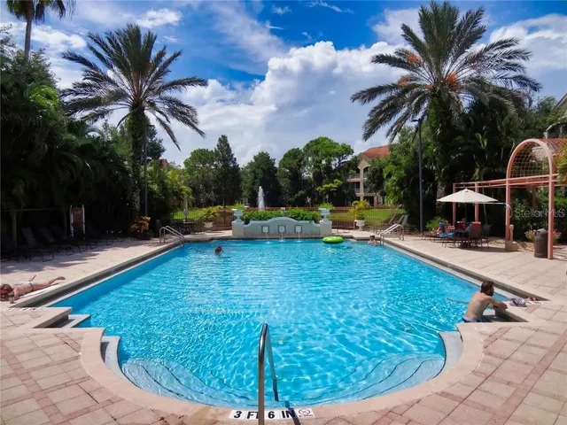 a room with gym equipment and large mirror