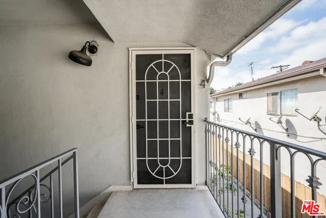 a view of a door and deck